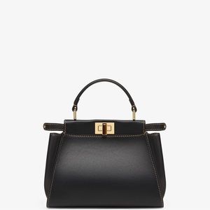 Brand new Fendi Peekaboo mini with crossbody strap.